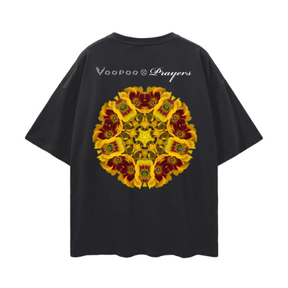 Black oversized t-shirt with kaleidoscope yellow flower graphic and 'Voodoo Prayers' text on back