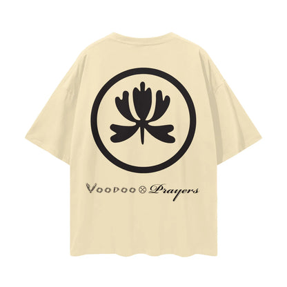 Beige oversized t-shirt with bold black lotus emblem and 'Voodoo Prayers' text on back