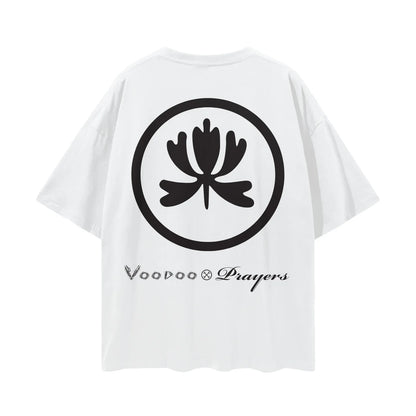 White oversized t-shirt with black abstract floral emblem and Voodoo Prayers text on back