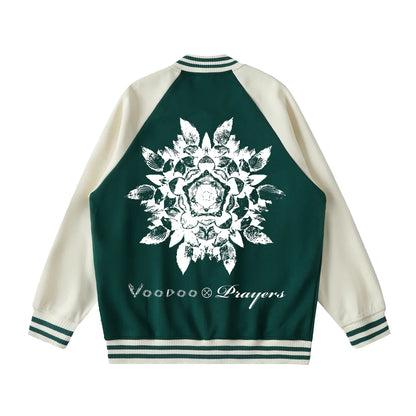 Green and white varsity jacket with bold mandala leaf print and script text on the back