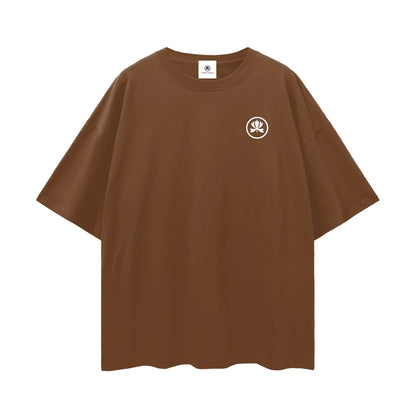Brown oversized t-shirt with small white lotus emblem on chest, streetwear style