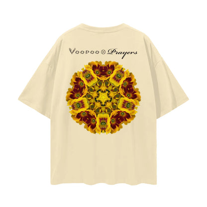 Beige oversized t-shirt with kaleidoscope yellow flower design and 'Voodoo Prayers' text on back