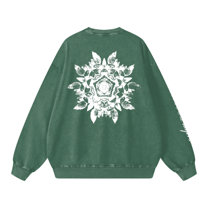 Green sweatshirt with a white floral design on the back against a white background