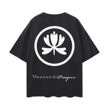 Black oversized t-shirt with bold white abstract flower emblem and Voodoo Prayers text on back