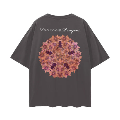 Black oversized t-shirt with psychedelic floral mandala and 'Voodoo Prayers' text on back