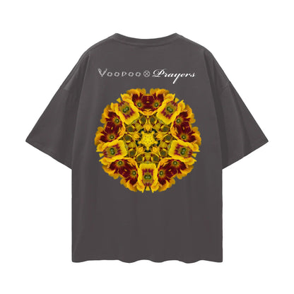 Charcoal t-shirt with kaleidoscopic yellow and red floral graphic and Voodoo Prayers text