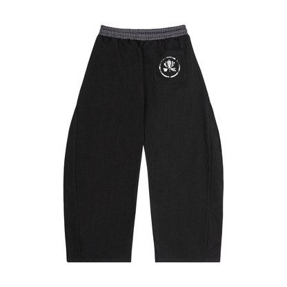 Black pants with white designs and 'War On Sin' text on a white background