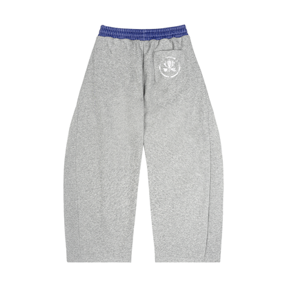Gray sweatpants with blue waistband and Diamond logo on a white background