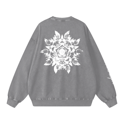 Gray sweatshirt with a white floral design on the back against a white background