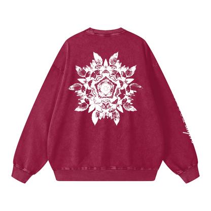 Red sweatshirt with a white floral design on the back against a white background