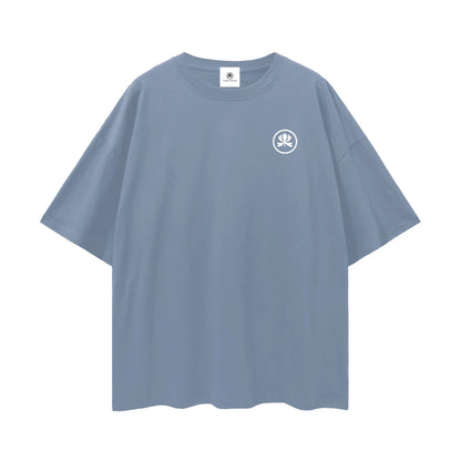 Minimalist blue oversized t-shirt with white spiritual symbol on chest, streetwear style
